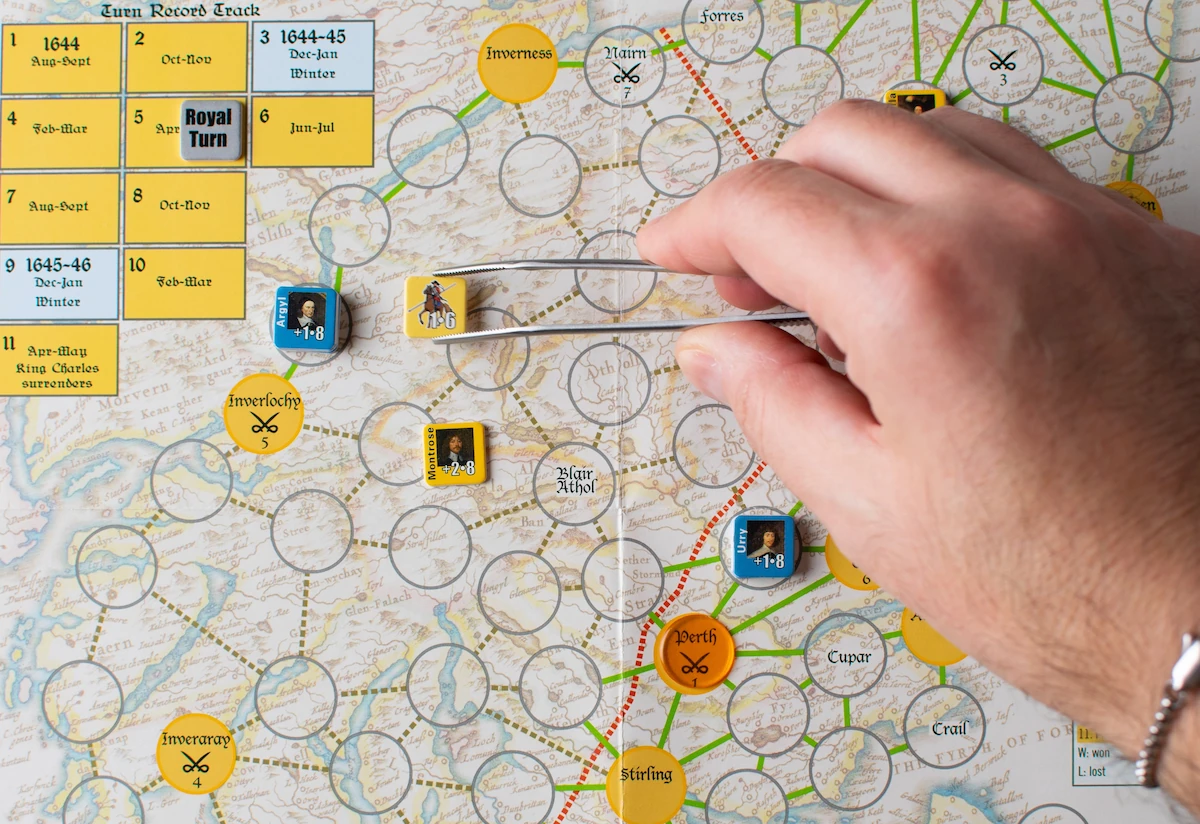 A Royalist cavalry unit moves toward Inverlochy, with Montrose and Argyll counters on the map in Campaigns of Montrose